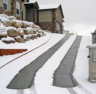 A radiant heated driveway after a snowstorm.